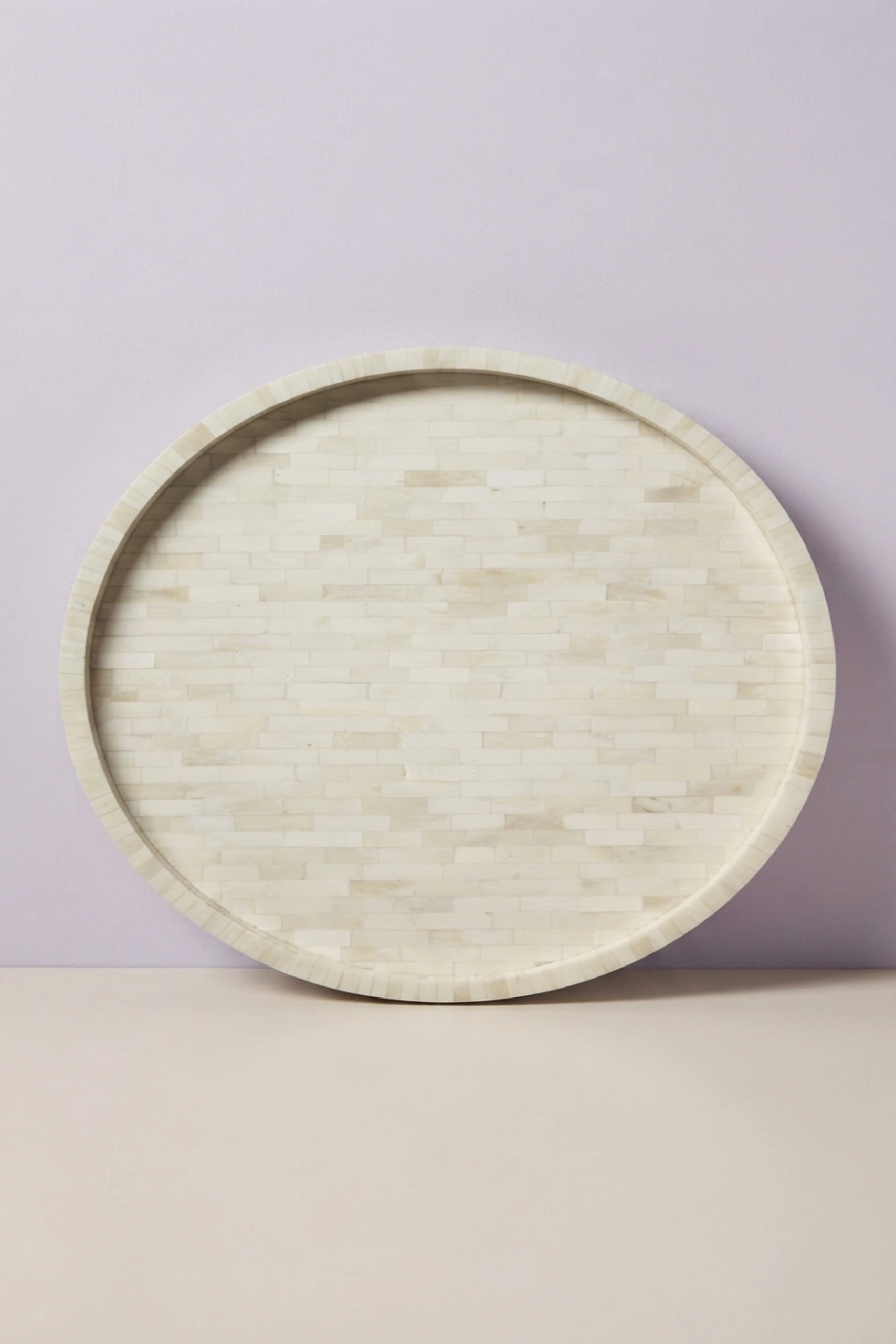 Full_Bone_Inlay_Round_Tray_image_02_angled_view_luxury_bone_inlay_decorative_tray_serving_tray_tabletop_home_decor_handcrafted_artisan_premium_interior_accent.webp
