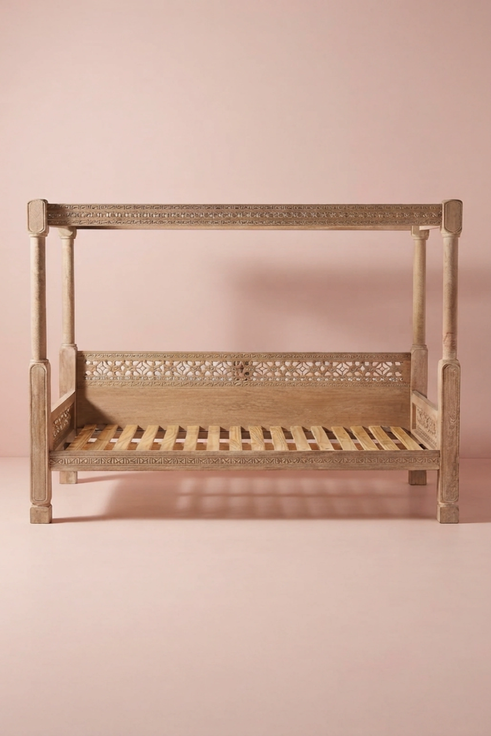 Handcarved_Ezana_Canopy_Daybed_Natural_image_02_angled_view_luxury_handcarved_wooden_daybed_cane_bedroom_living_room_lounge_artisan_premium_interior_furniture.webp