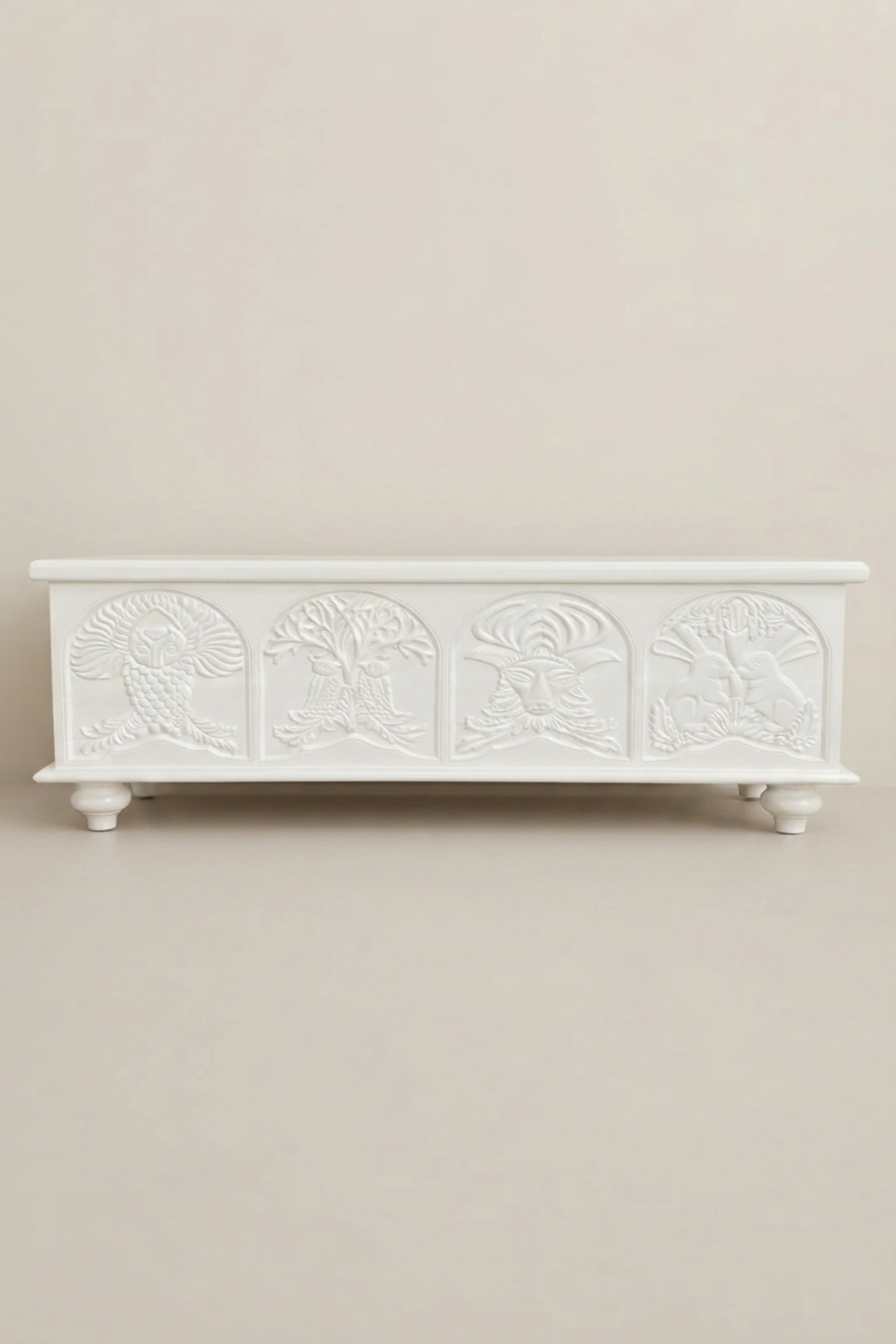 Handcarved Menagerie Trunk White, buy handcarved menagerie trunk white, luxury handcarved menagerie trunk white, handcrafted handcarved menagerie trunk white, handmade handcarved menagerie trunk whiteHandcarved_Menagerie_Trunk_White_image_01_front_view_luxury_handcarved_storage_trunk_chest_white_decorative_bedroom_living_room_artisan_premium_furniture.webp