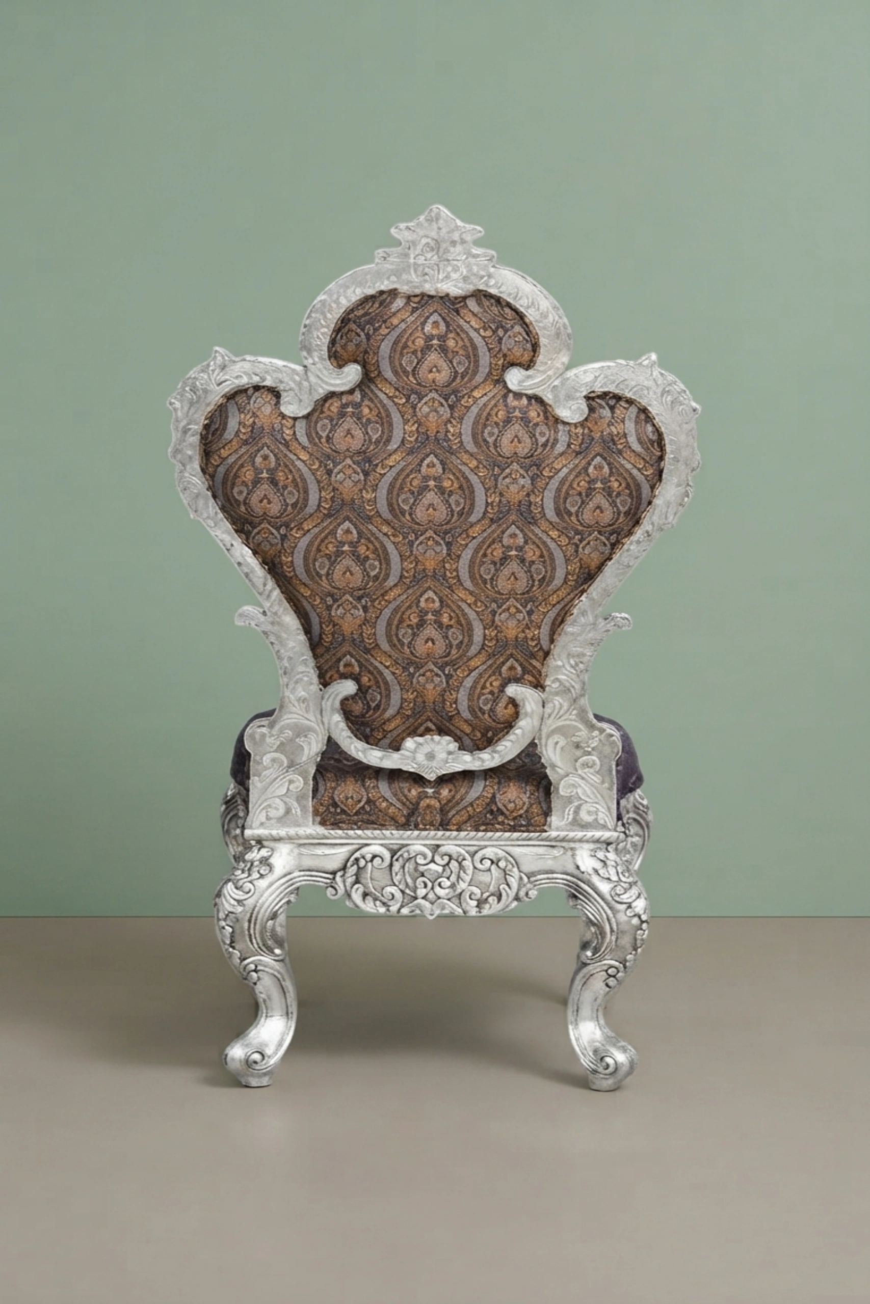 Huyo_Silver_Chair_image_02_angled_view_luxury_velvet_accent_chair_lounge_seating_designer_living_room_upholstered_artisan_premium_interior_furniture.webp