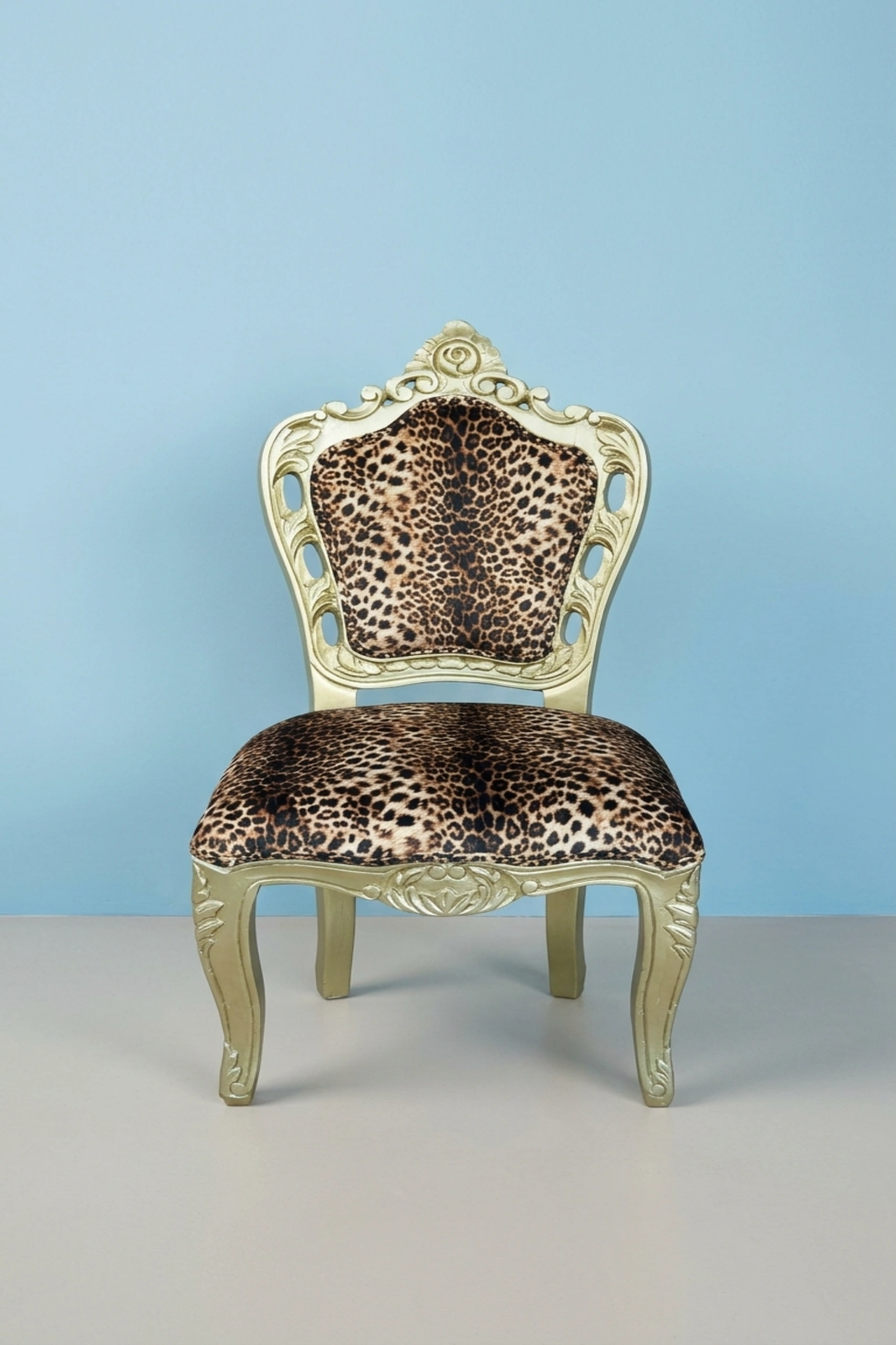 leopard print velvet chair,animal print accent chair,luxury velvet fabric chair,leopard design upholstered lounge chair,wild print designer living room chair,premium leopard velvet accent seatingLeopard_Design_Velvet_Fabric_Chair_image_01_front_view_luxury_velvet_accent_chair_lounge_seating_designer_living_room_upholstered_artisan_premium_interior_furniture.webp