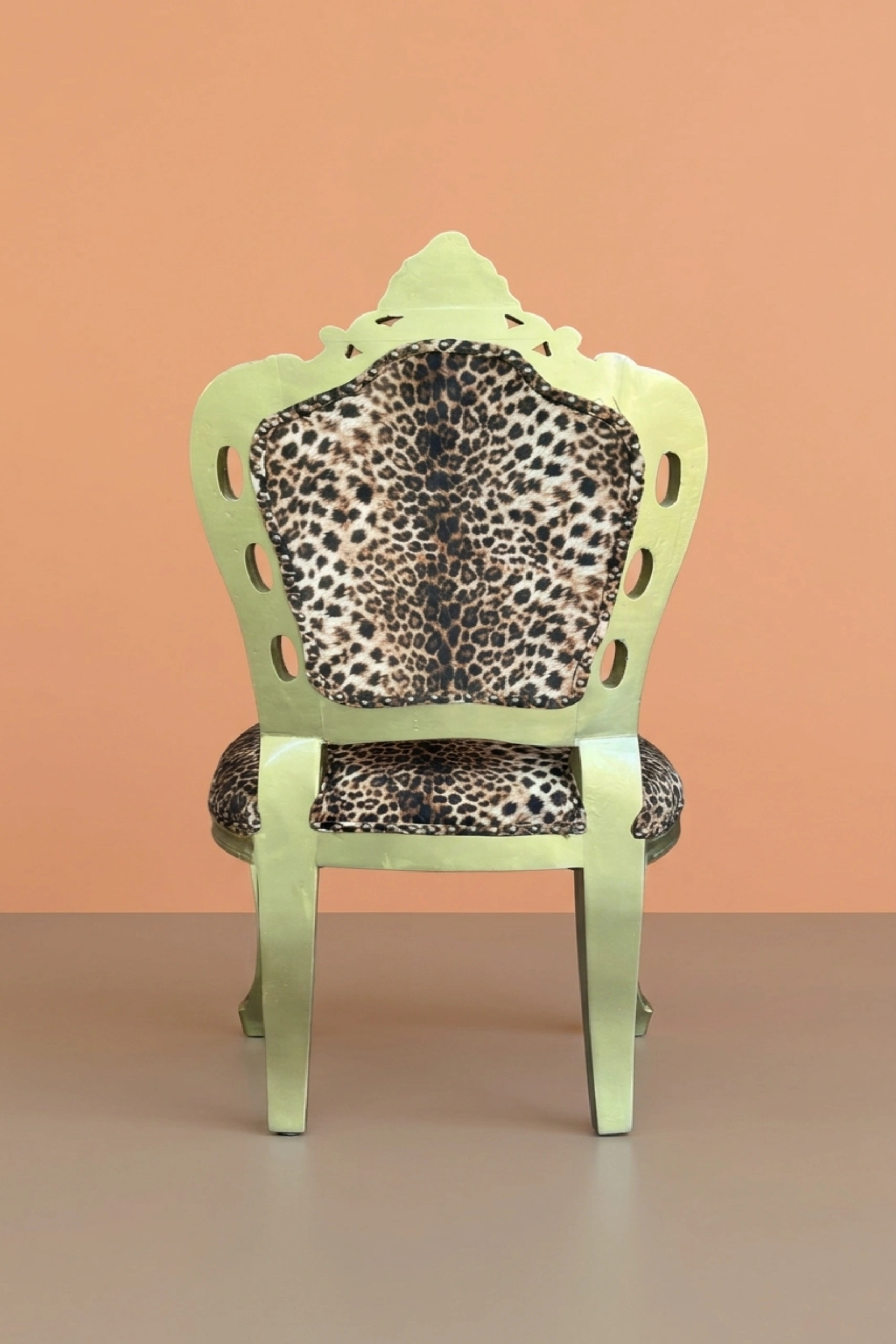 Leopard_Design_Velvet_Fabric_Chair_image_02_angled_view_luxury_velvet_accent_chair_lounge_seating_designer_living_room_upholstered_artisan_premium_interior_furniture.webp