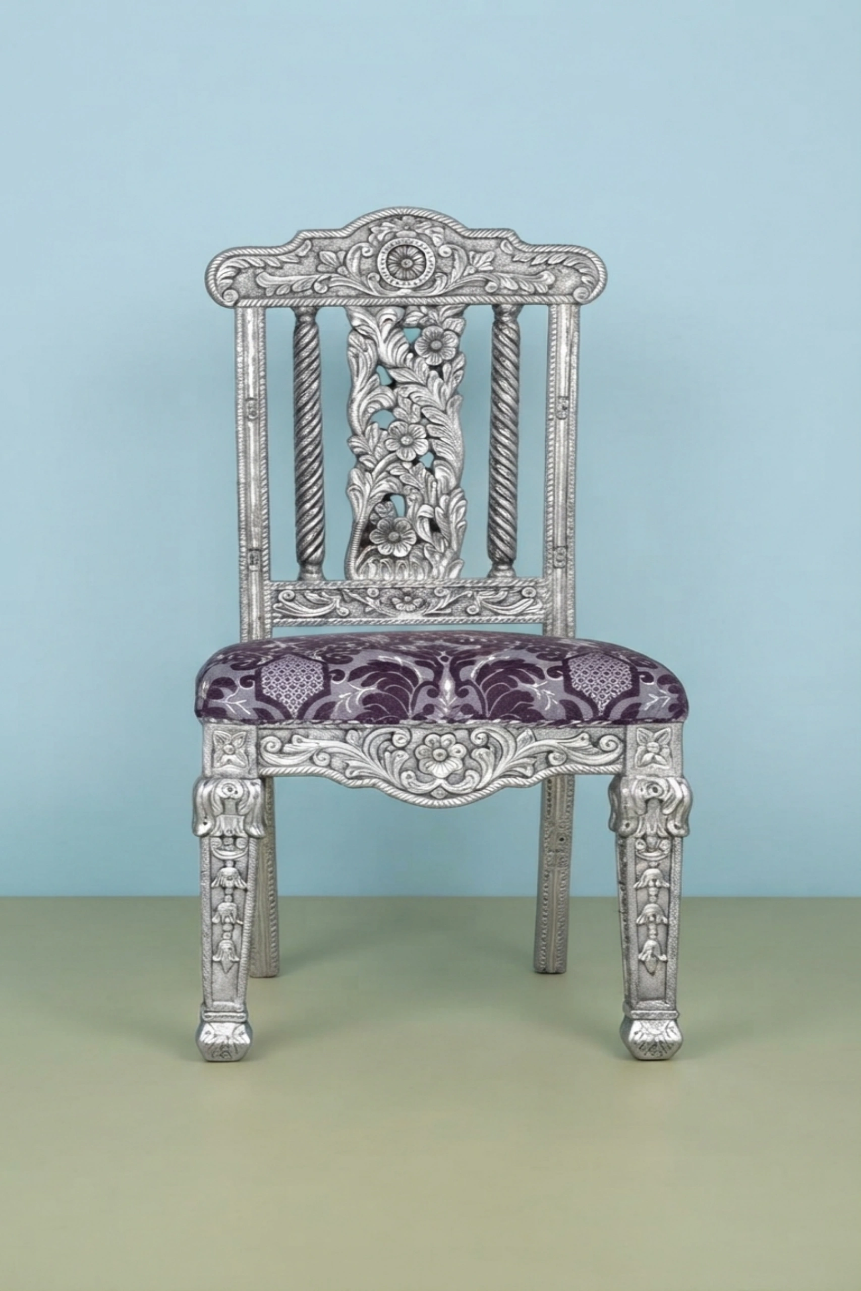 Ruyo silver chair,silver accent lounge chair,luxury upholstered silver seating,Ruyo designer silver chair,premium silver interior accent chair,artisan silver lounge seatingRuyo_Silver_Chair_image_01_front_view_luxury_velvet_accent_chair_lounge_seating_designer_living_room_upholstered_artisan_premium_interior_furniture.webp