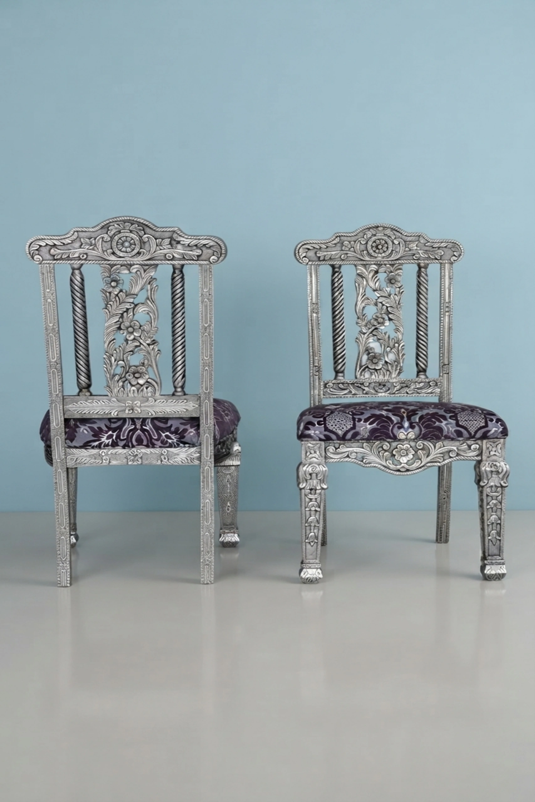 Ruyo_Silver_Chair_image_02_angled_view_luxury_velvet_accent_chair_lounge_seating_designer_living_room_upholstered_artisan_premium_interior_furniture.webp