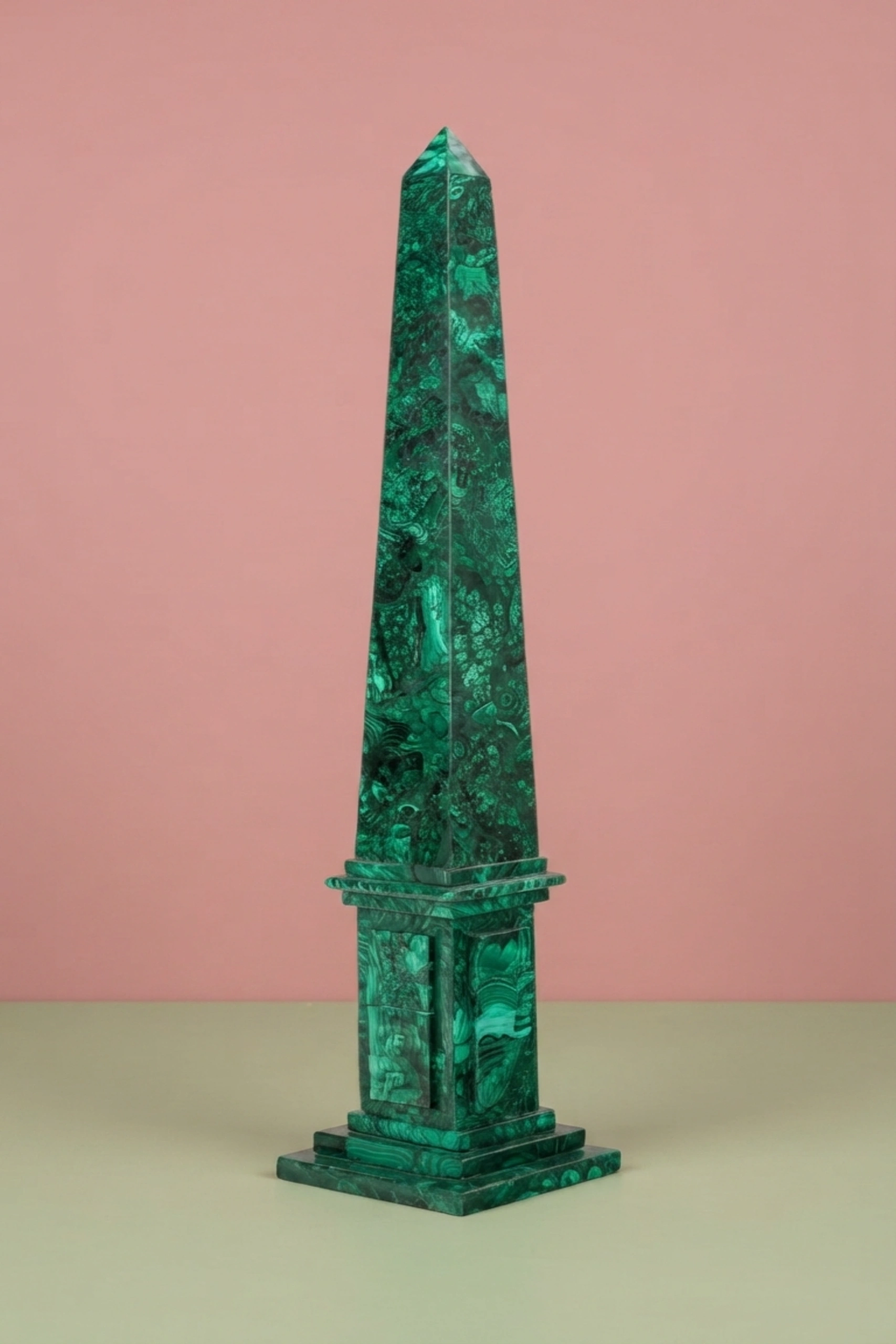 Premium_Malachite_Obelisk_image_02_angled_view_premium_malachite_obelisk_green_stone_sculpture_decorative_tabletop_luxury_interior_home_decor_accent.webp
