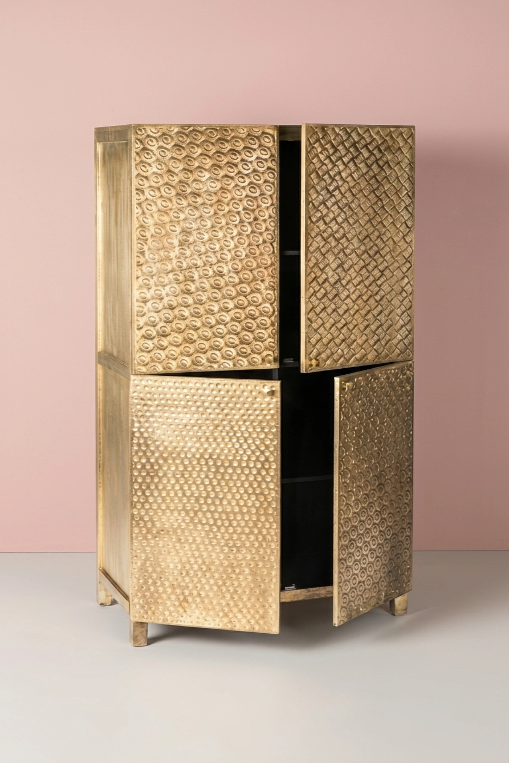 Elio_Brass_Embossed_4_Door_Cupboard_image_02_angled_view_luxury_storage_wardrobe_armoire_cupboard_handcrafted_bedroom_living_room_artisan_premium_interior_furniture.webp