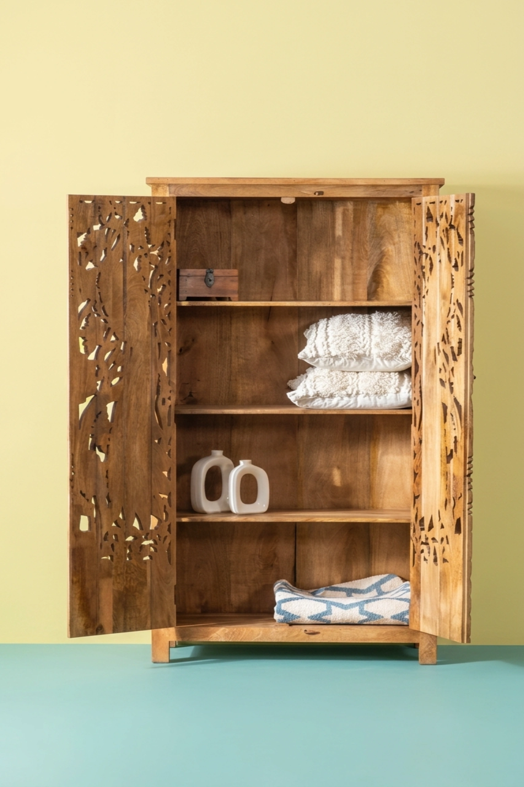 Handcarved_Peacock_Design_Almirah_Natural_image_02_angled_view_luxury_storage_wardrobe_armoire_cupboard_handcrafted_bedroom_living_room_artisan_premium_interior_furniture.webp