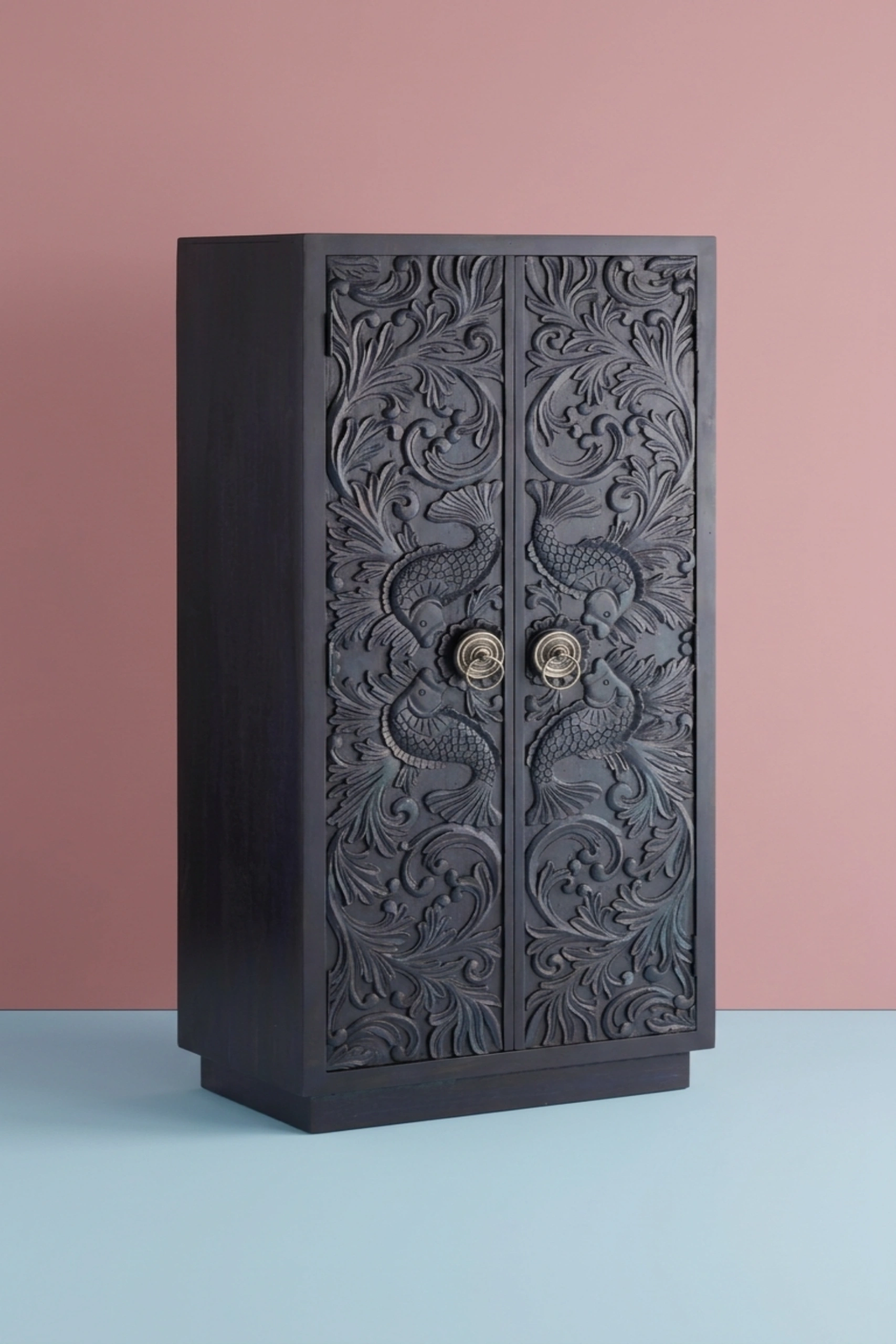 Matasya_Handcarved_Almirah_Indigo_image_02_angled_view_luxury_storage_wardrobe_armoire_cupboard_handcrafted_bedroom_living_room_artisan_premium_interior_furniture.webp