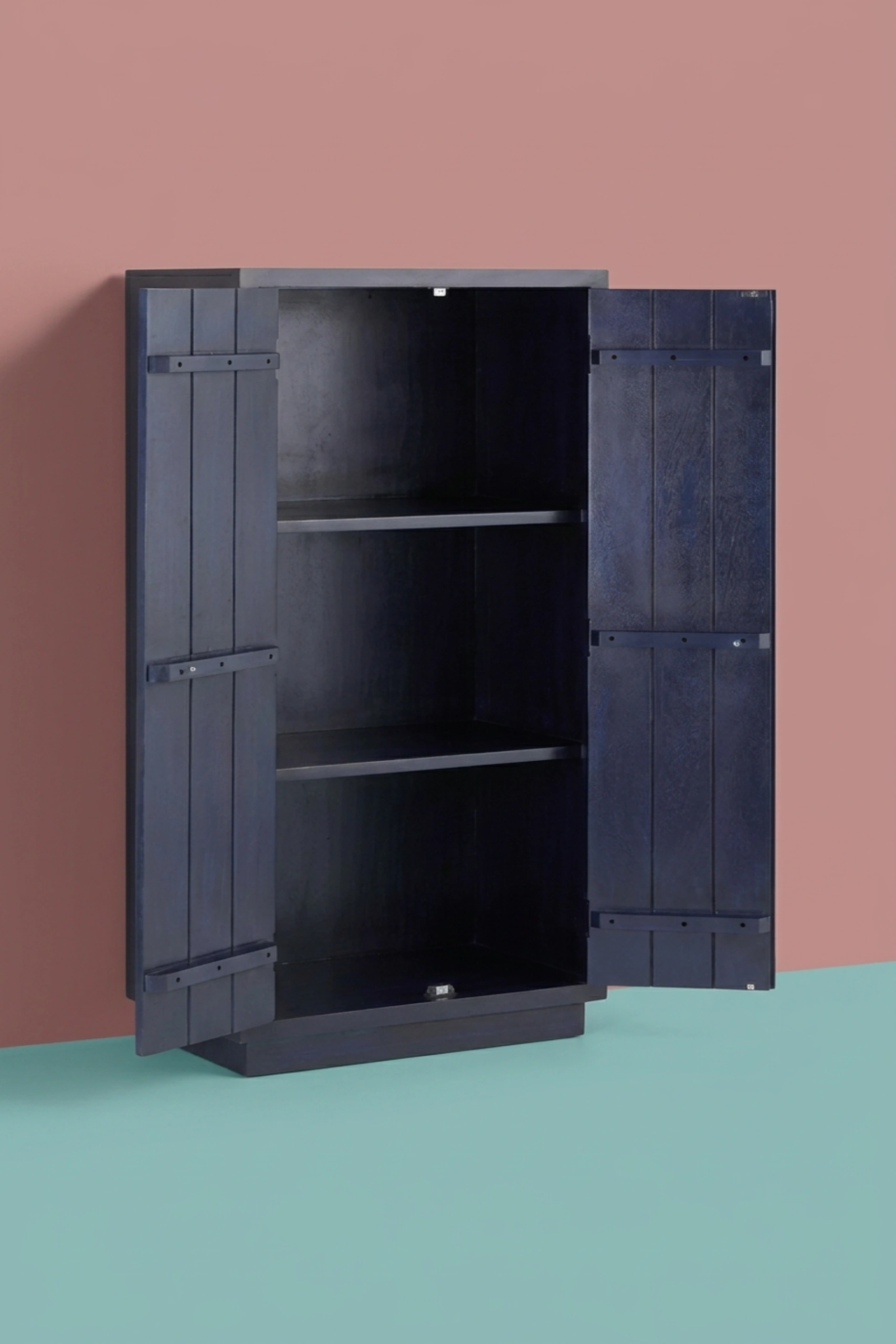 Matasya_Handcarved_Almirah_Indigo_image_03_side_profile_luxury_storage_wardrobe_armoire_cupboard_handcrafted_bedroom_living_room_artisan_premium_interior_furniture.webp