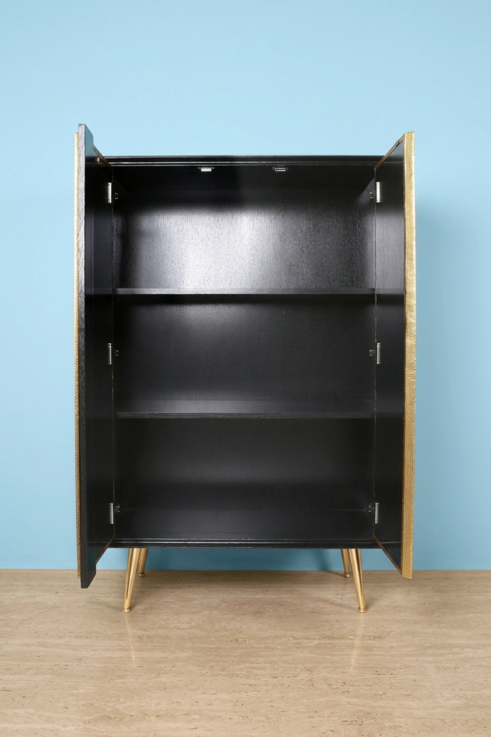 Music_Brass_Armoire_image_04_detail_closeup_luxury_storage_wardrobe_armoire_cupboard_handcrafted_bedroom_living_room_artisan_premium_interior_furniture.webp