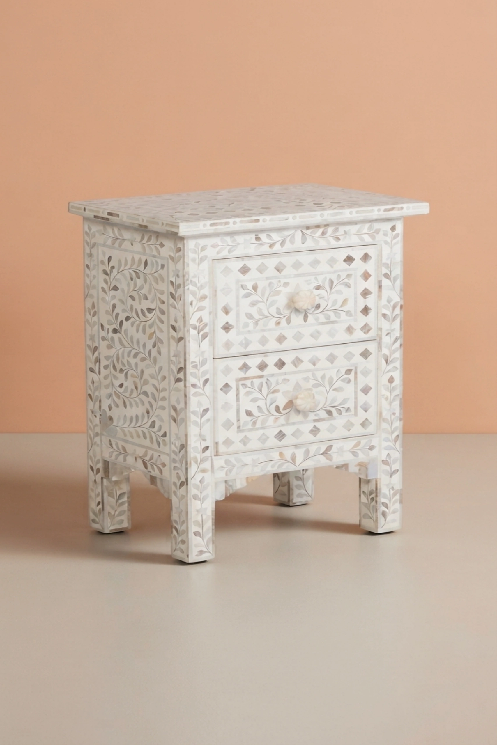 mother-of-pearl-inlay-floral-2-drawer-bedside-white-bedside-table-floral-design-floral-pattern-flower-motif-mop-inlay-furniture-mother-of-pearl-inlay-night-02.webp